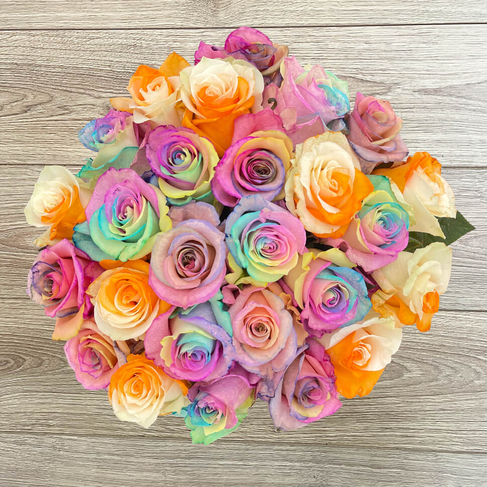 Pastel purples, pinks, yellows roses - Cinnamon Bouquet by Rosaholics