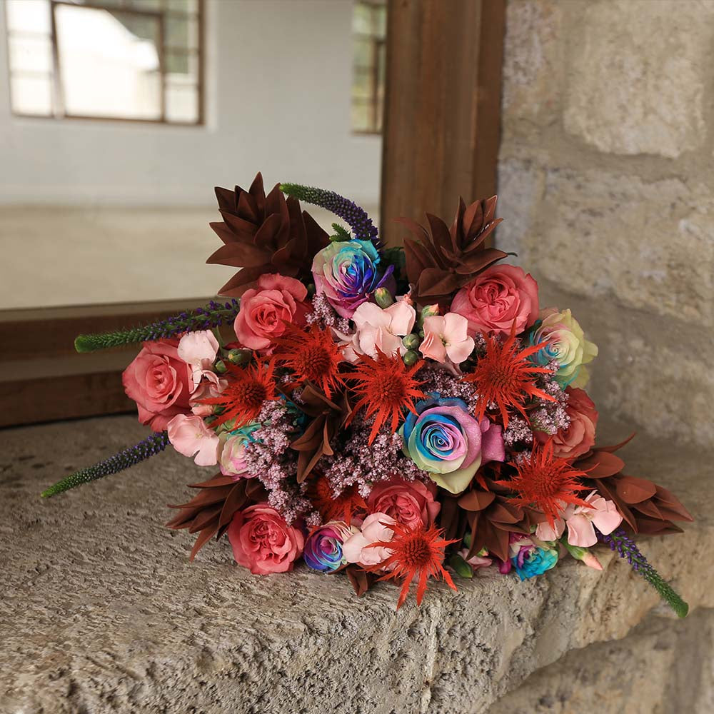 Lollapalooza - pink roses bouquet with Eryngium flowers, limonium, hebes