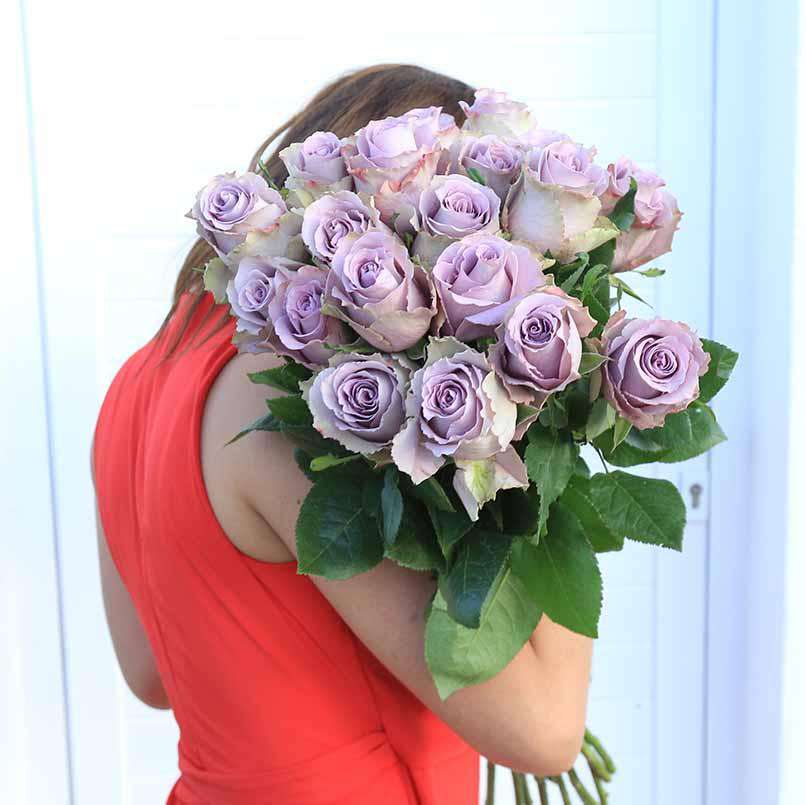 A young woman is holding Grey Knights bouquet