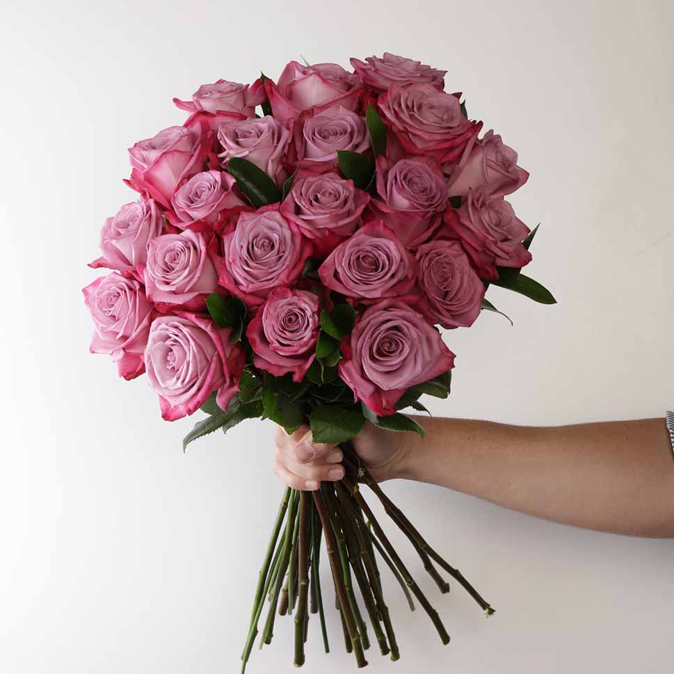 Purple Love Rose Bouquet in a hand