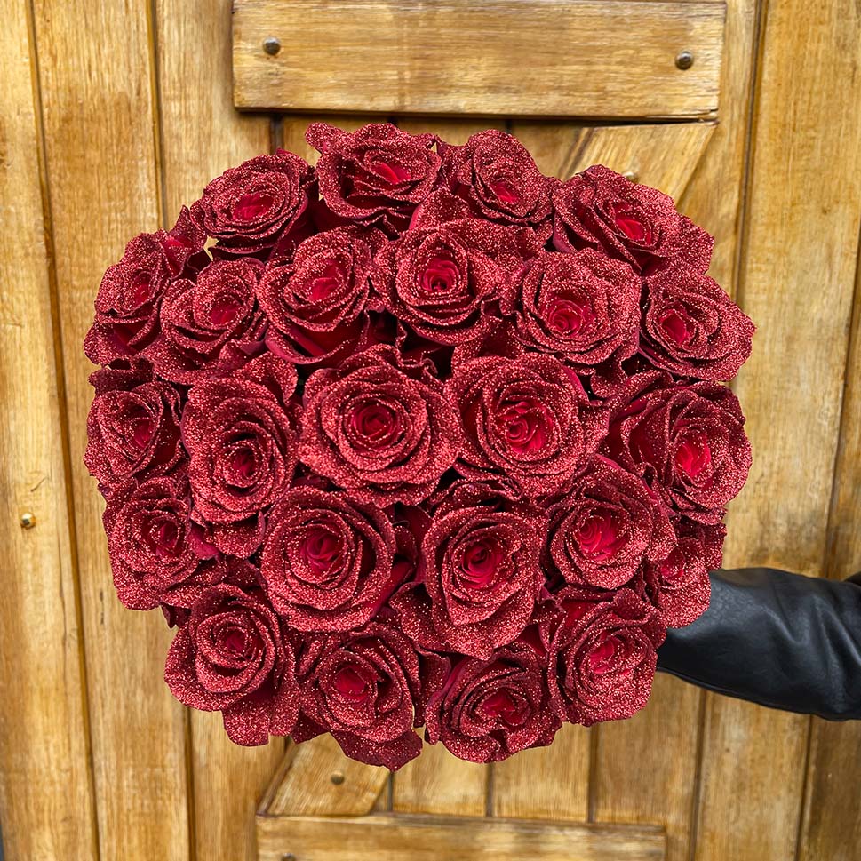 Red Sparkle Roses - Eloisa Rose Bouquet in a hand