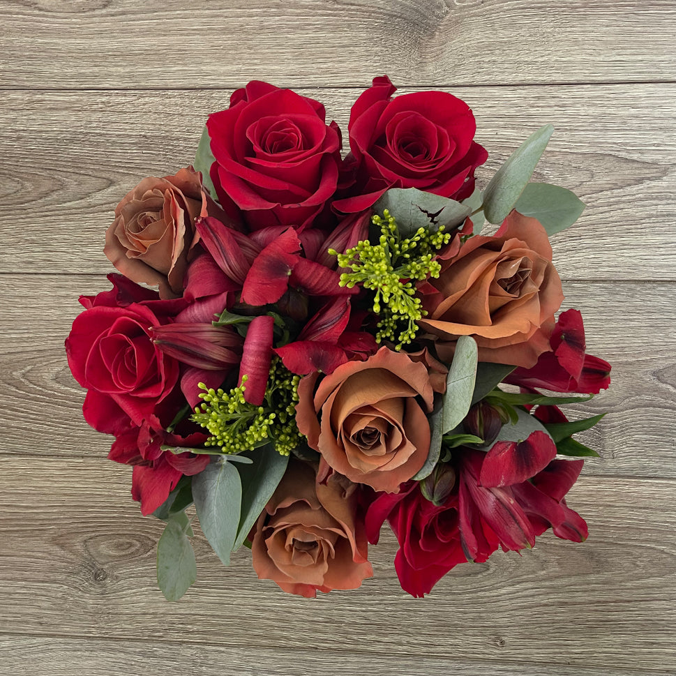Gingerbread Bouquet - a blend of Christmas red and brown roses 