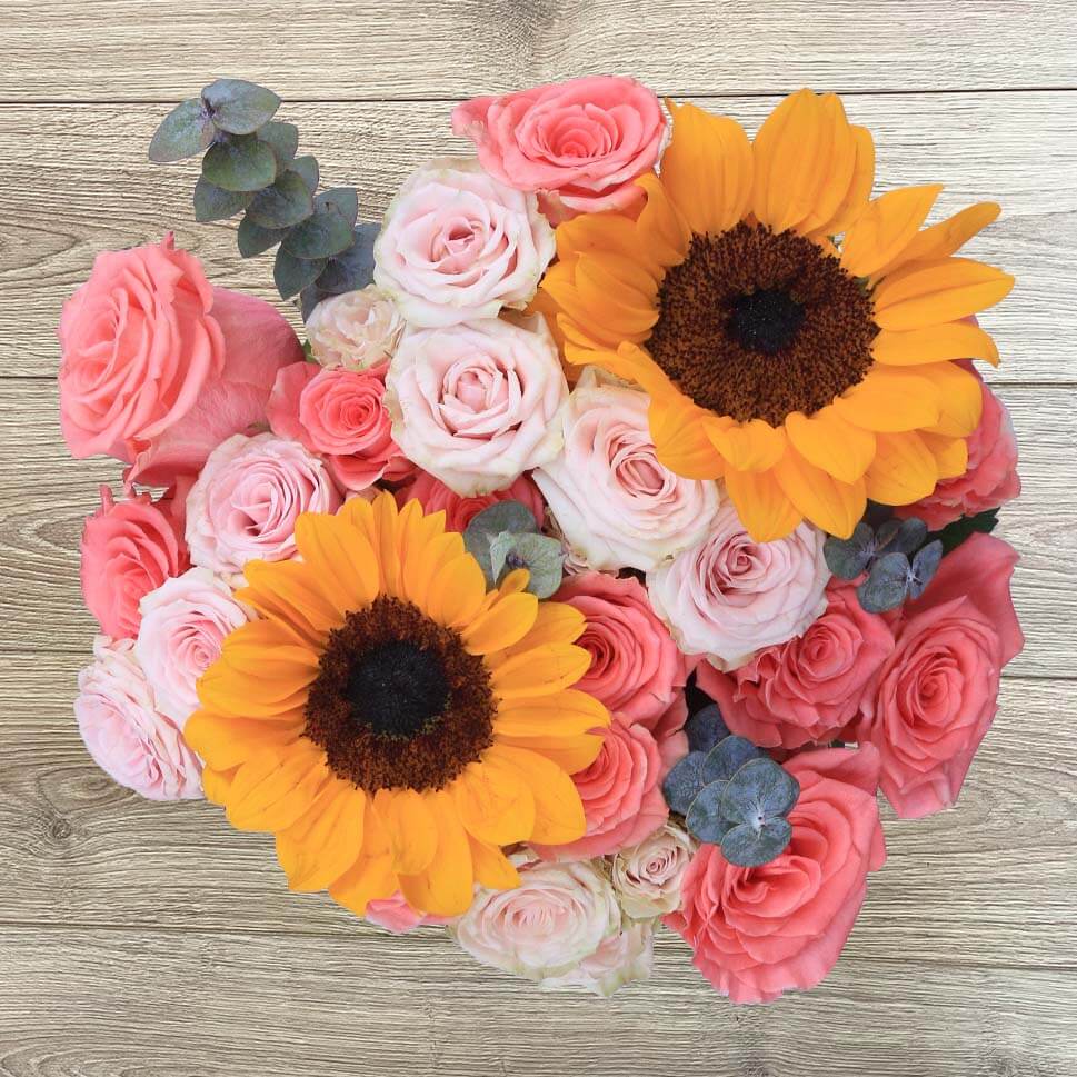Coral and Pink Roses with Sunflowers Bouquet by Rosaholics